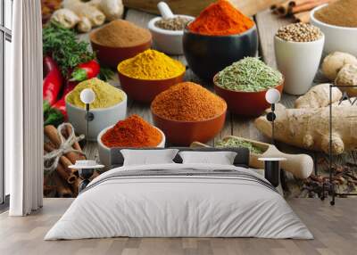 Various aromatic colorful spices and herbs. Ingredients for cooking..Ayurveda treatments. Wall mural