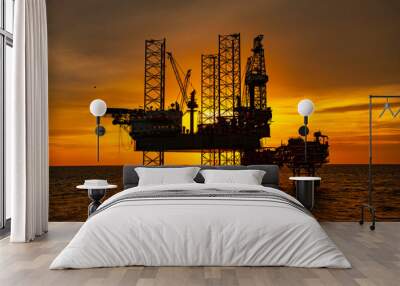 oil drilling rig at sunset Wall mural