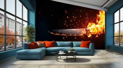 A fiery blade with sparks and flames creates a dramatic visual impact against a dark background, emphasizing themes of danger and intensity. Wall mural