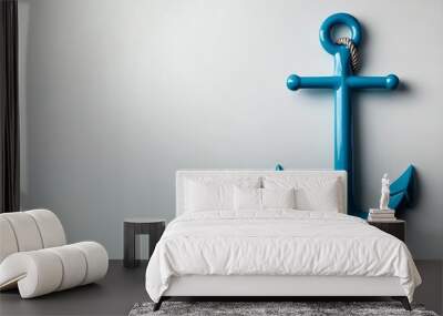 A vibrant blue anchor is showcased against a light background, symbolizing stability and nautical themes. Wall mural