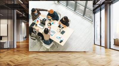 Asian business start up freelance people team analyzing statistics financial. Group Team of businesspeople man and woman Meeting Conference Discussion various topic Corporate Concept in office. Wall mural