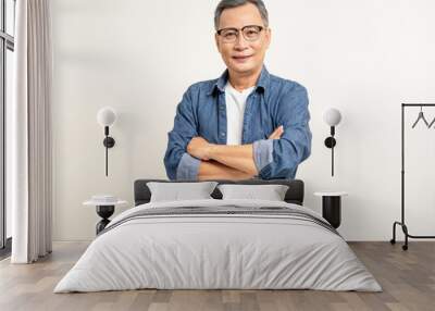 Handsome asian mature old man standing arm crossed on isolated white background. Happy Portrait of cheerful smiling senior asian man looking at camera. Mature People and lifestyle Wall mural