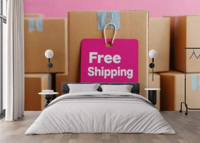 Cardboard boxes with a tag reading Free Shipping on a vibrant background Wall mural