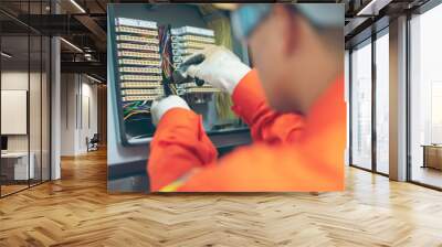 close up men working with the control cabinet Wall mural