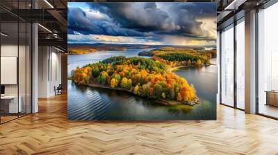 Peninsula in autumnal colors with dark clouds in sky Wall mural