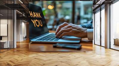 Businessman using a laptop and showing text 