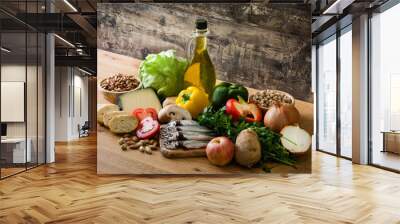 Healthy eating. Mediterranean diet. Fruit,vegetables, grain, nuts olive oil and fish on wooden table Wall mural