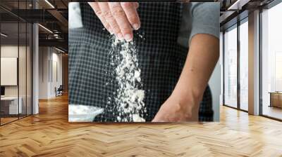 woman kneading bread dough with her hands Wall mural