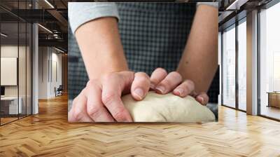 Woman making bread with her hands

 Wall mural