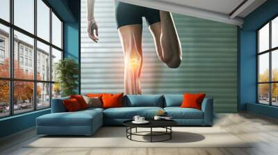 Woman, stretching legs and knee injury in gym with joint pain with 3d overlay for wellness training. Fitness expert, x ray hologram for workout, exercise or health for performance with hurt muscle Wall mural