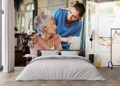 Healthcare, elderly woman with nurse with breakfast at her home and at the table in living room. Support or communication, caregiver and conversation with medical person with senior or old female. Wall mural