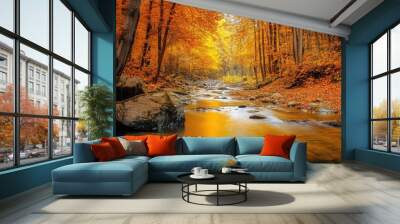 A serene fall nature scene with a clear stream winding through a forest of golden trees Wall mural