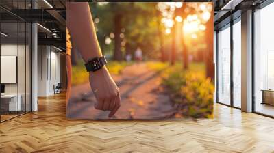 A wearable fitness tracker displaying real-time health metrics during a run in a city park. Wall mural