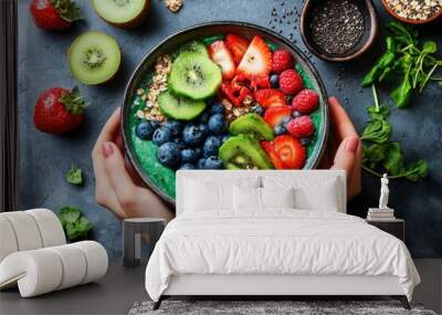 Healthy lifestyle with a person preparing a smoothie bowl, fresh ingredients, and vibrant colors representing vitality Wall mural