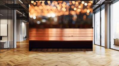 image of wooden table in front of abstract blurred background of resturant lights Wall mural