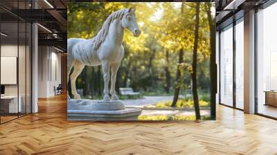 Marble statue of a horse in a park Wall mural