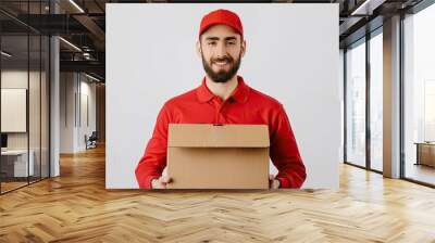 Positive delivery courier with parcel box, promoting reliable shipping service on white Wall mural