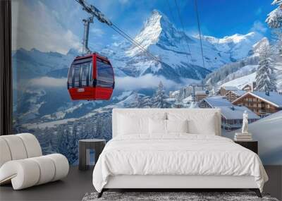 Scenic winter view of Eiger Express gondola with Grindelwald village and snow-covered Wetterhorn mountain in the background Wall mural