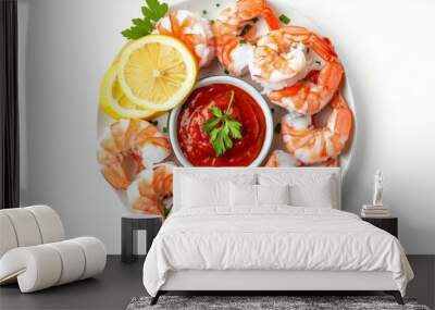 Top down view of a Black Tiger cocktail shrimp ring with tomatoe cocktail sauce and lemon slices isolated on white Wall mural