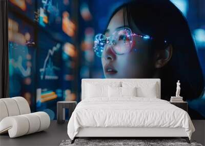 Young asian woman watching hologram screens. Business technology. Wall mural