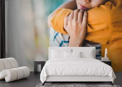 Young depressed asian woman hug her friend for encouragement, Selective focus, PTSD Mental health concept. Wall mural