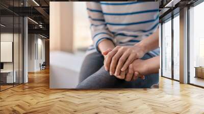 Young woman sitting and touch young depressed asian woman for encouragement near window, Selective focus, PTSD Mental health concept. Wall mural