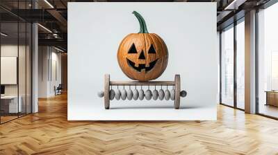 A smiling pumpkin on a wooden egg holder against a white background. Wall mural