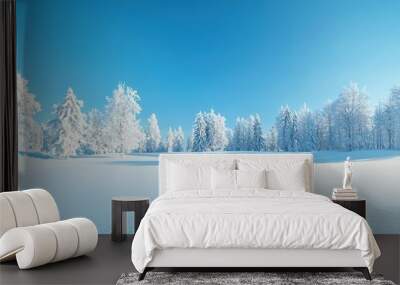 Serene winter landscape featuring a blanket of snow and frost-covered trees under a clear blue sky. Wall mural