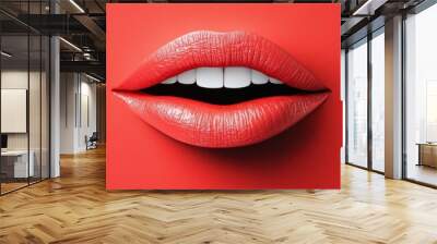 Stylish lips with a glossy finish on a vibrant red background Wall mural