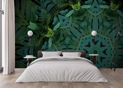 Abstract emerald green background, tropical leaves pattern with kaleidoscope effect. Wall mural