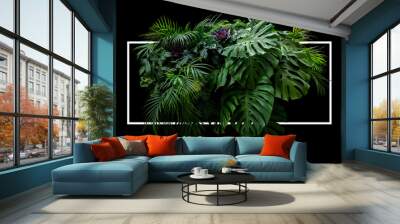 Tropical leaves foliage jungle plant bush floral arrangement nature backdrop with white frame on black background. Wall mural