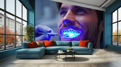 A close-up of a patient's bright white teeth with a slight smile Wall mural