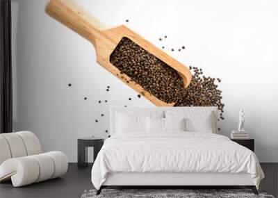 sesame seeds in wood scoop isolated on white background Wall mural