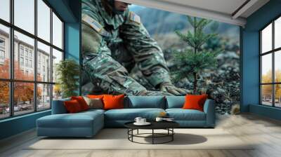 soldier planting a tree in a field, symbolizing growth and new beginnings after conflict. Wall mural