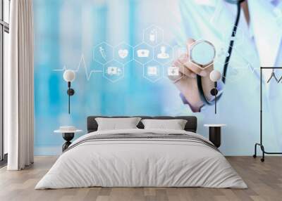 Medicine doctor holding stethoscope in hand touching icon medical connection with modern virtual screen interface, medical technology concept. Wall mural