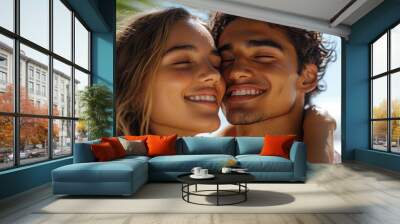 A joyful couple enjoys sunny day outdoors, sharing tender moment while applying sunscreen on each others faces. Their smiles radiate happiness and love Wall mural