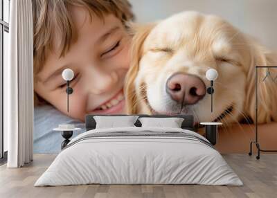 A joyful child cuddling a golden retriever indoors during a sunny afternoon Wall mural