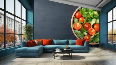 Fresh salad with cherry tomatoes in a wooden bowl Wall mural