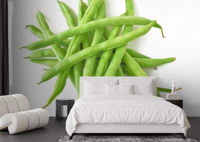 Isolated beans. Pile of raw green beans (haricot), top view, isolated on white background Wall mural