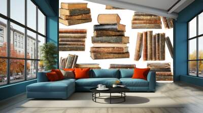 Isolated old books. Collection of old books in piles and stacks isolated on white background with clipping path Wall mural