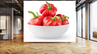 Isolated peppers. Pile of red bell peppers in a bowl isolated on white background Wall mural