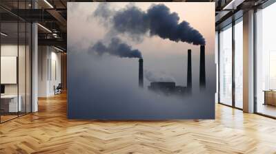 A cloudy sky enveloped in heavy smoke from a series of industrial chimneys, capturing the essence of modern urban challenges and environmental concerns. Wall mural