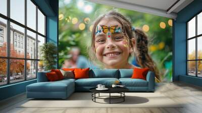 A smiling girl with butterfly face paint enjoys a garden party Wall mural