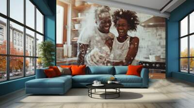 Happy couple having fun while baking together in kitchen Wall mural