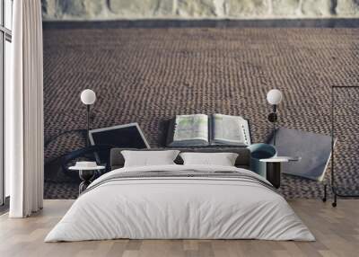 Photo of open Bible, coffee, notepad and tablet on a rug Wall mural