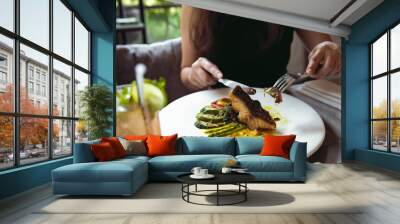 Luxury table settings for fine dining served and decorated table with food for guests in the restaurant Wall mural