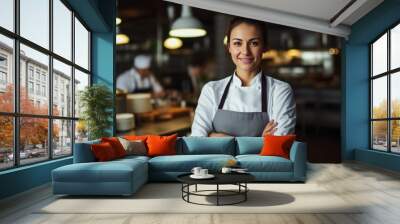 Smiling female chef in her restaurant women owned business concept Wall mural