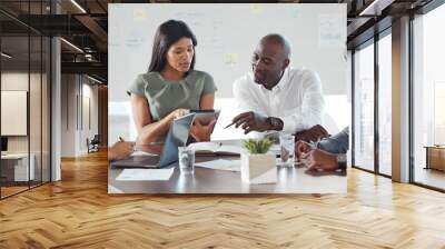 Business people, planning and meeting with strategy, goal and collaboration on digital tablet. Employee or workers in creative ideas, support and teamwork work vision at a startup company office Wall mural