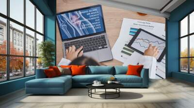 Medical, laptop data analysis or doctors hands with tablet, report or documents for knee surgery review. Medicine paper, study or nurse on chart for healthcare learning, wellness science or research Wall mural