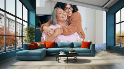 Senior, woman or daughter with hug for love, laugh or joke in dining room of house with happy. Family, mother and person with embrace, smile and care for relaxing, peace and comic in lounge of home Wall mural